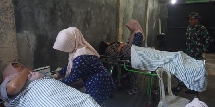 Antusias Masyarakat Ikuti Pelayanan KB Gratis di Lokasi TMMD Reguler Ke 121 Desa Pacet